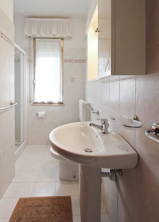 Apartmán Residenza Ibsen Lignano Sabbiadoro Pokoj fotografie