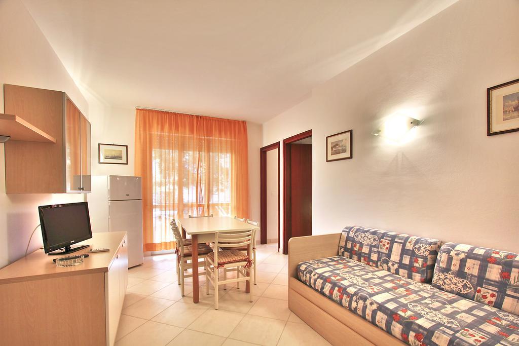 Apartmán Residenza Ibsen Lignano Sabbiadoro Pokoj fotografie